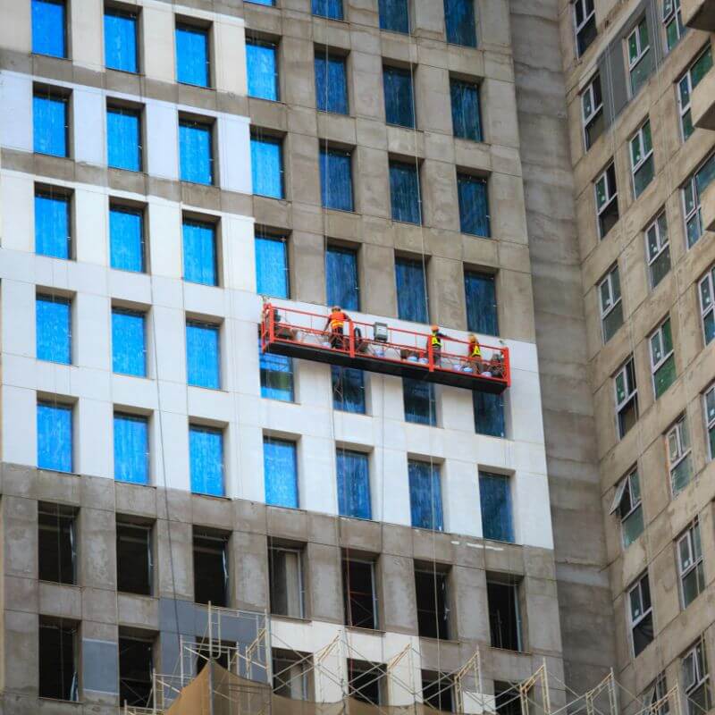 Suspended Scaffolding on high rise building with works cleaning building